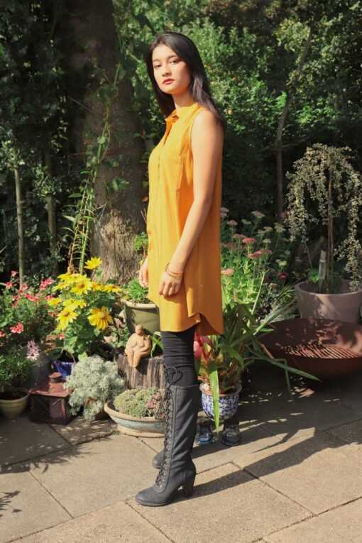 Sleeveless long yellow shirt in trendy loose fit design