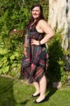 Black boho dress with floral patterns in light and airy cotton.