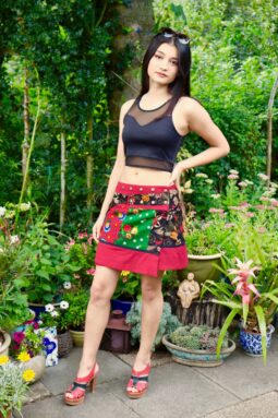 Amazing wrap mini skirt in red with patchwork pattern. One size with pockets and 100 % cotton quality